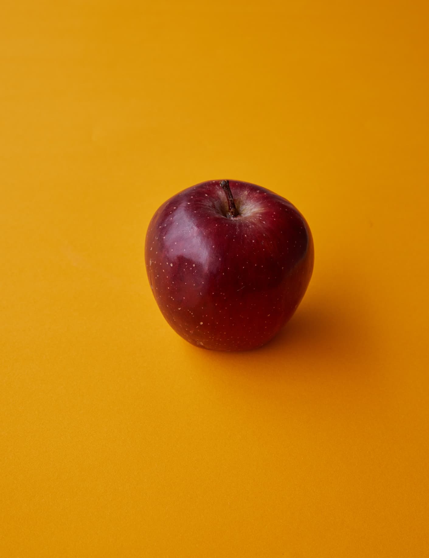 Apple with Orange Background